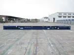 Flat Rack Container 40 Fuß mit schwerer Maschine